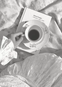 lifestyle pic of a coffee with a book